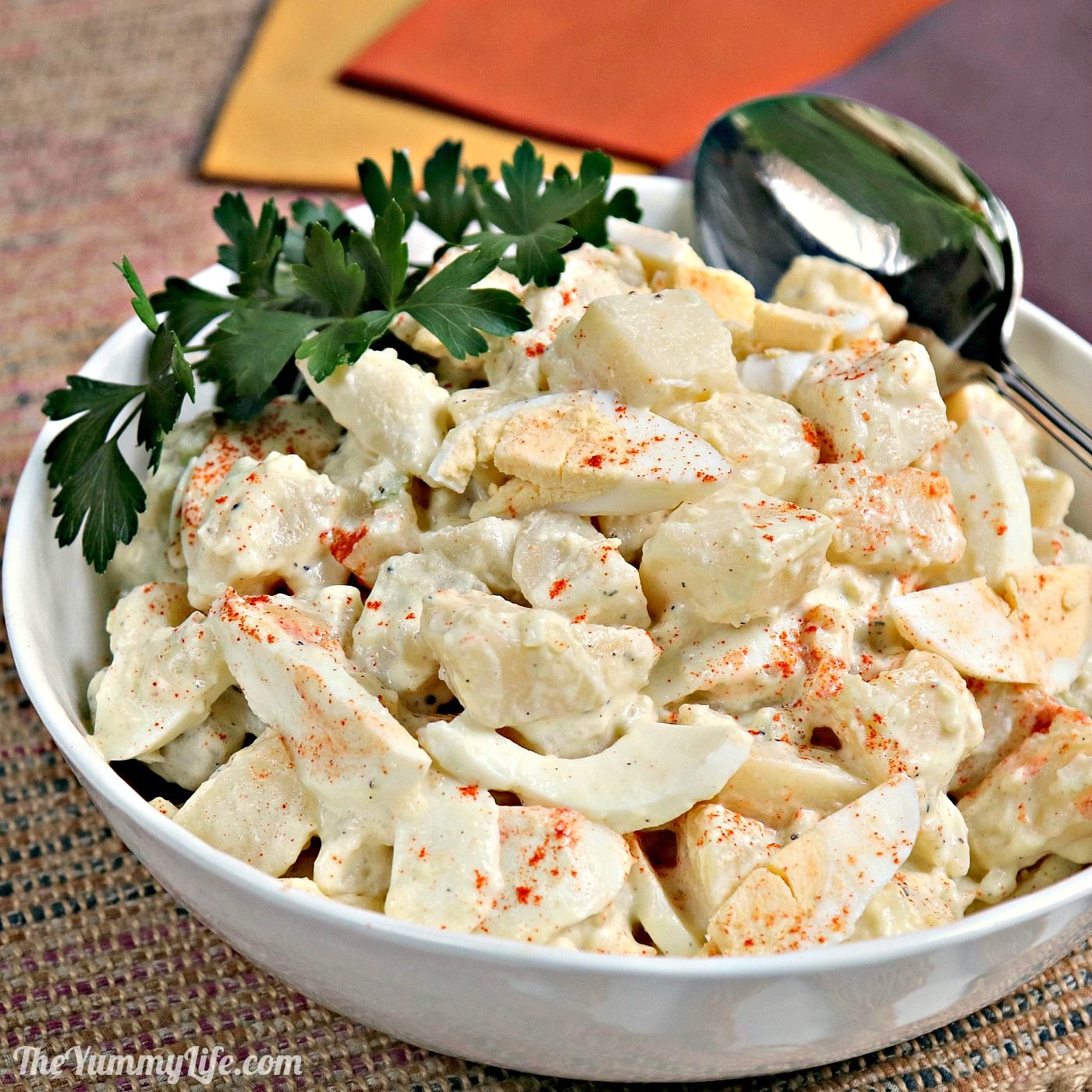 Add potatoes, celery and onion; Classic Creamy Potato Salad
