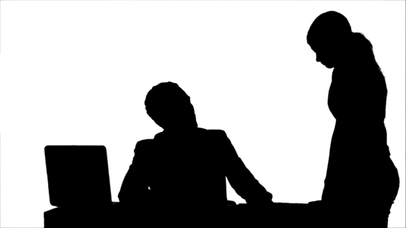 Silhouette Angry Boss With Female Worker In Office by