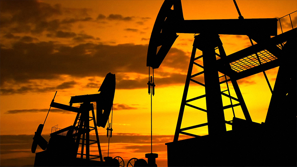 Oil Pump Industrial Machines For Petroleum In The Sunset