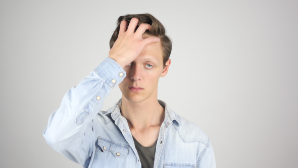 Young Man Playing with his Hair, Hairstyle by Stockwood VideoHive
