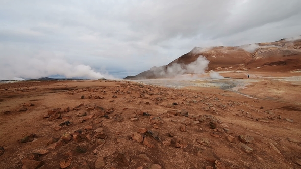 Eruption of Geyser in Iceland. Red Soil, Like the Surface of the Mars by mstandret