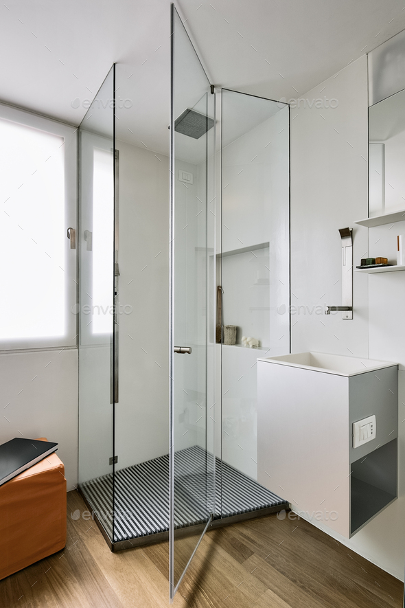 CloseUp on the Glass Shower Box in the Modern Bathroom with Wooden