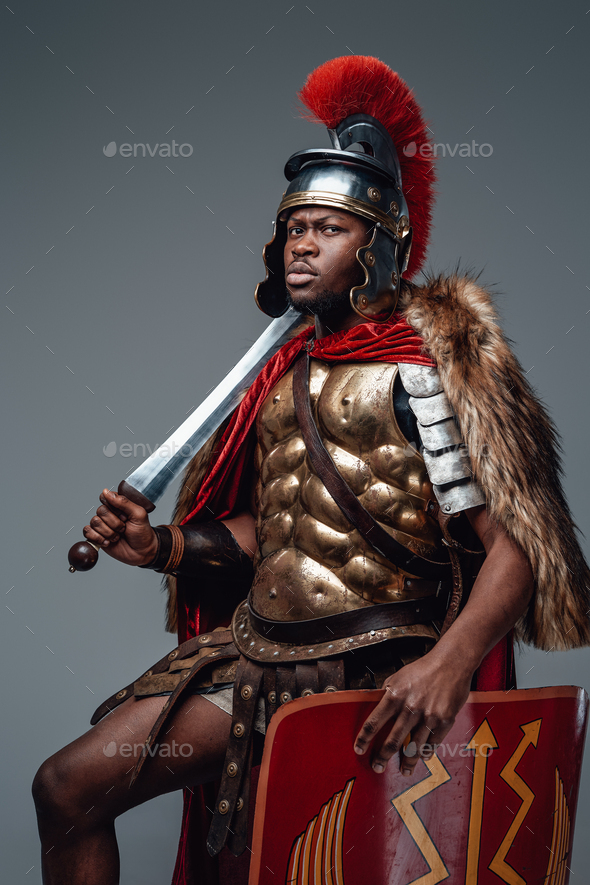 Ancient roman soldier of african descent with sword Stock Photo by fxquadro