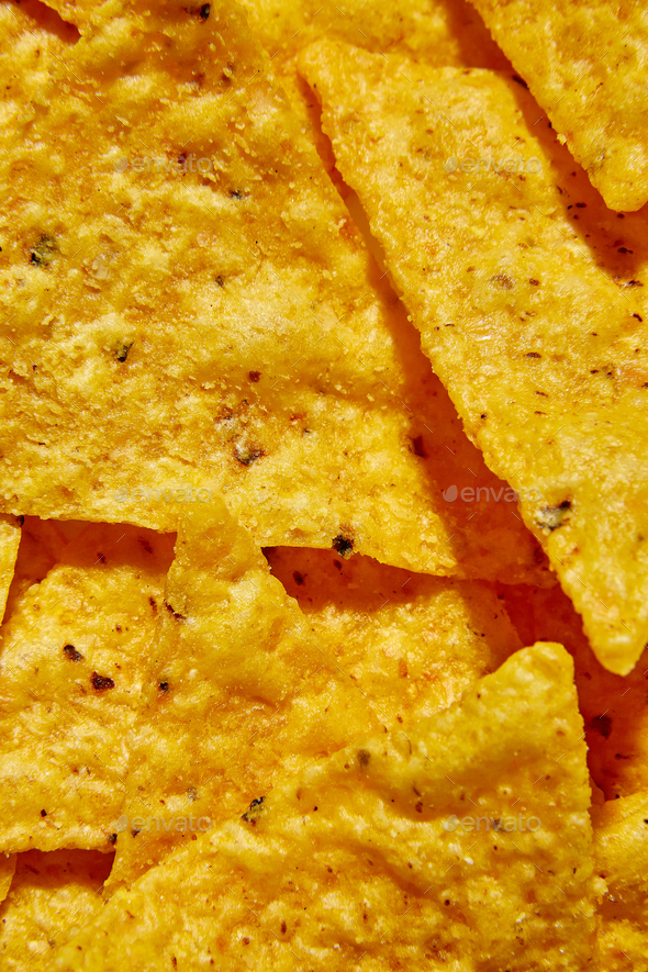 Flat lay macro nacho chips, Background of Corn Tortilla Chips Stock