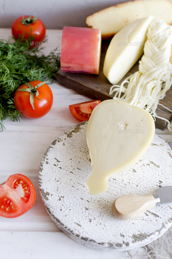 Assorted cheeses Pasta filata {Provolone) in various shapes and sizes