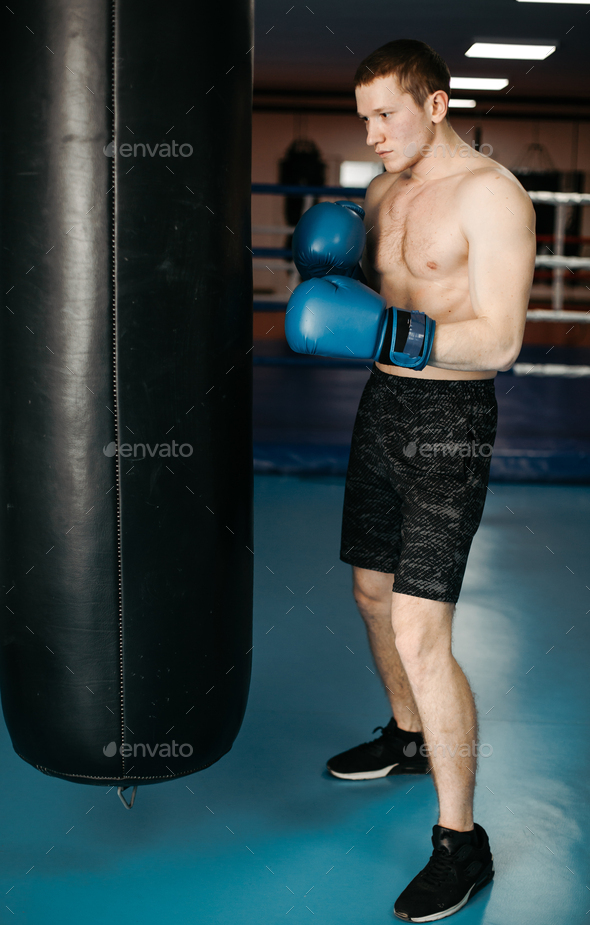 Boxers train in the ring and in the gym Stock Photo by yavorandriy