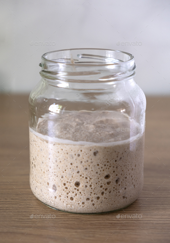The fermentation process of sourdough starter. Stock Photo by bukatju