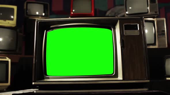 Old TV Green Screen in the Middle of Many TVs. Aesthetics of the 80s. by Maradonas_land