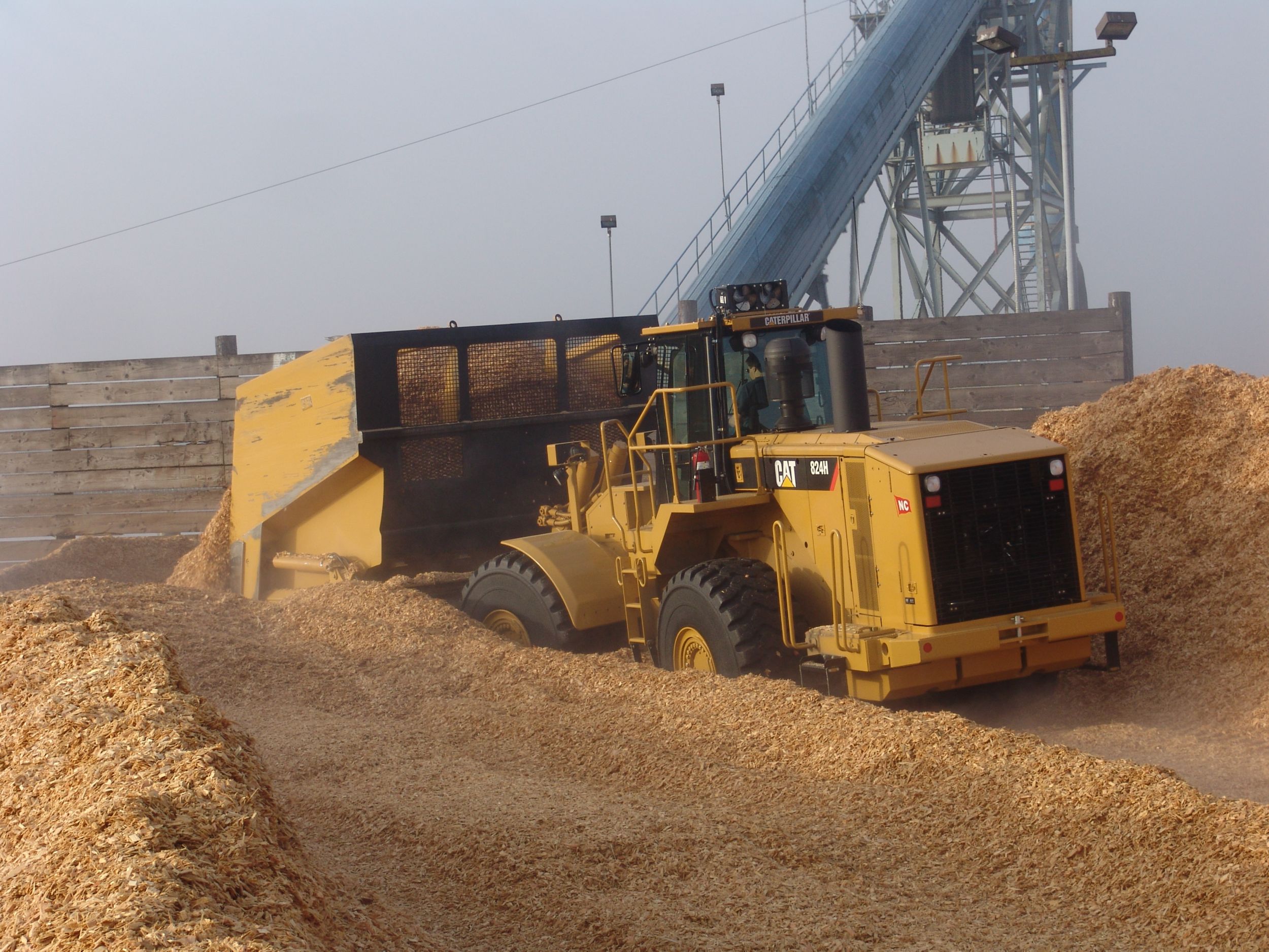 Cat 824H Wood Chip Scoops Caterpillar