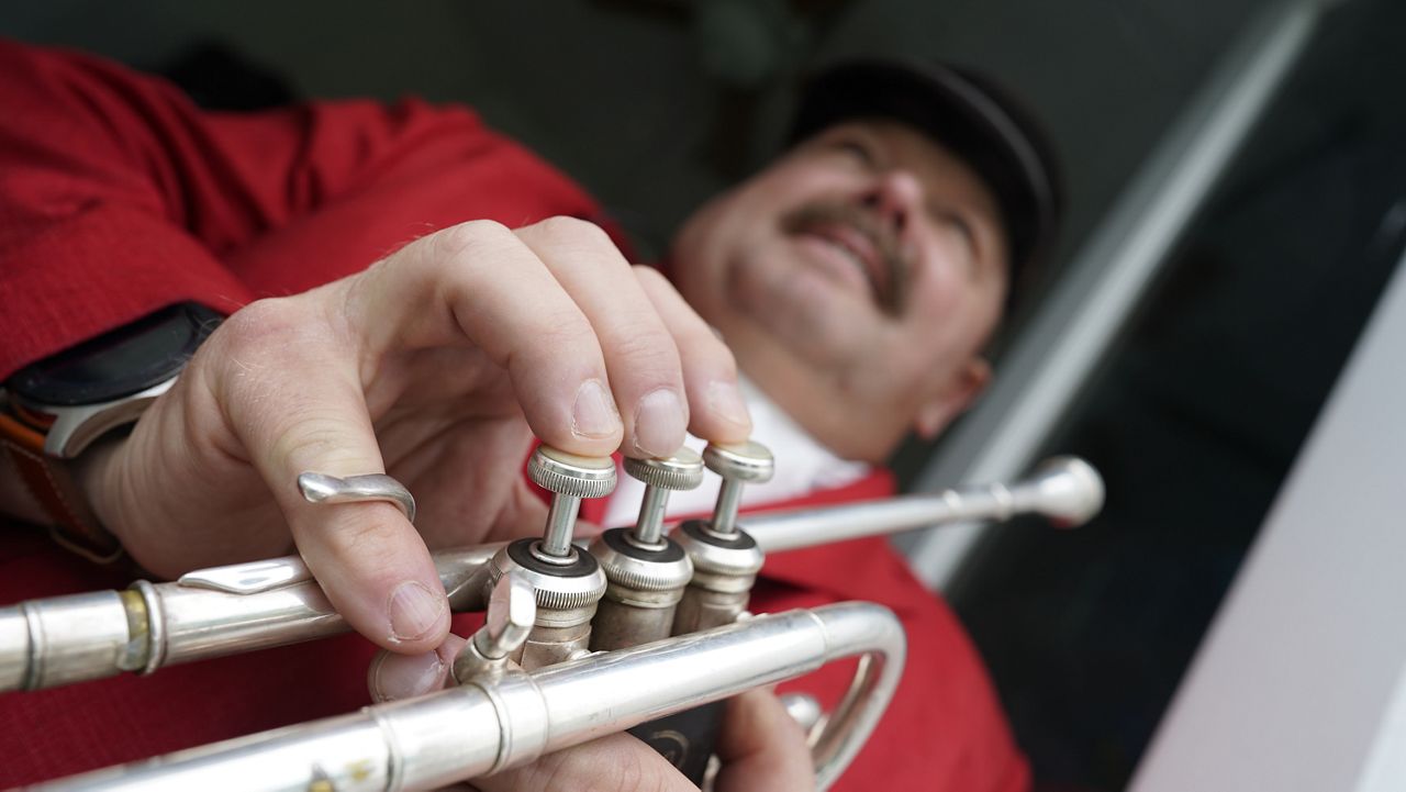 Churchill Down's official bugler has played for millions
