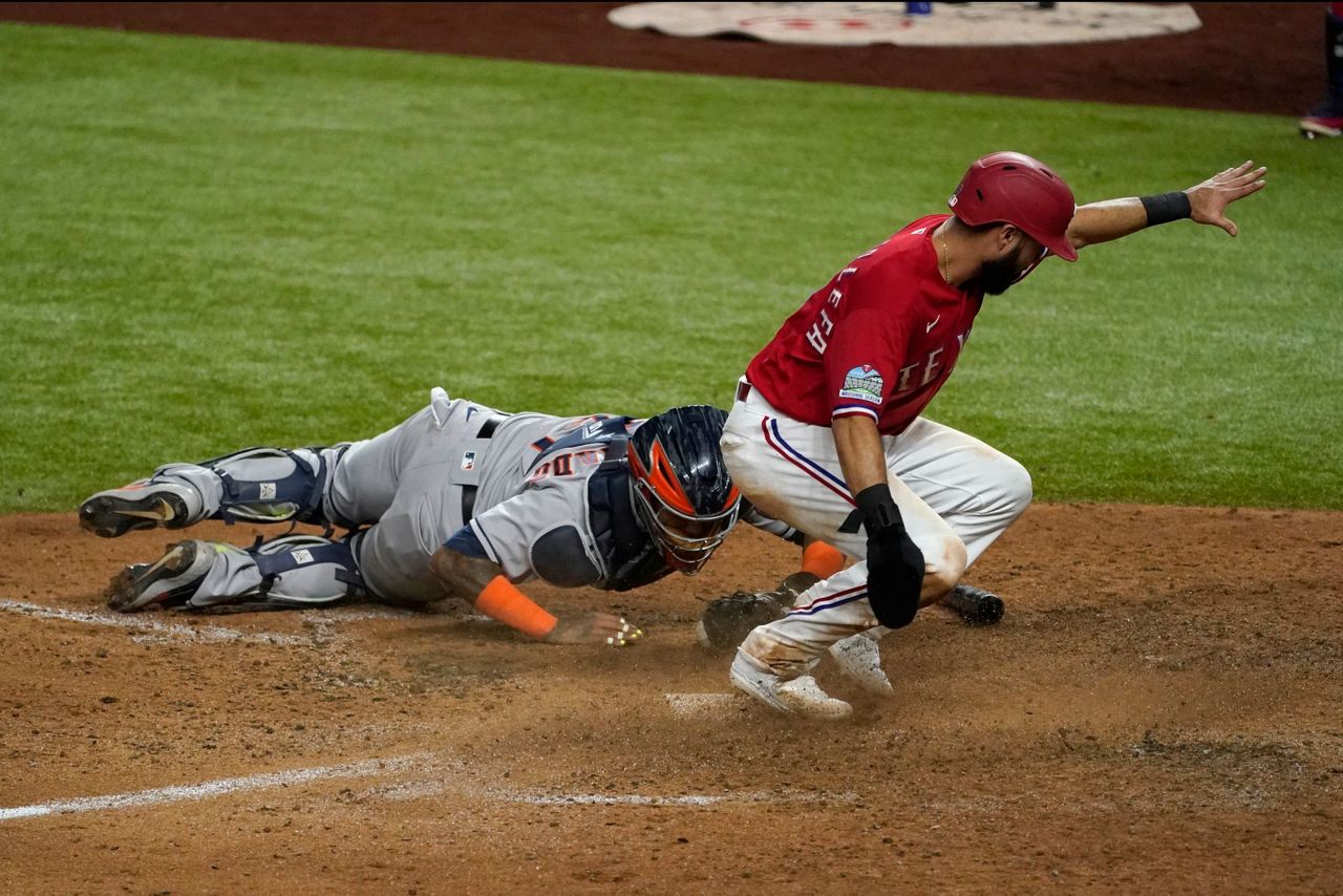 Astros clinch final AL playoff spot despite loss to Rangers