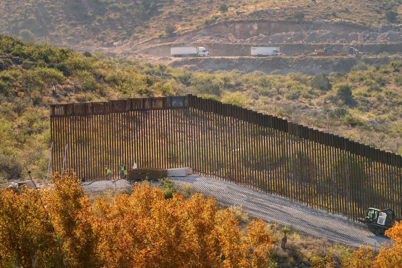 Damage from border wall blownup mountains, toppled cactus