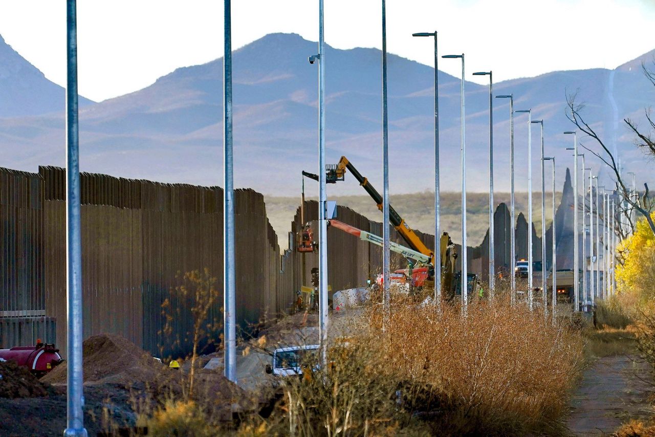 Damage from border wall blownup mountains, toppled cactus