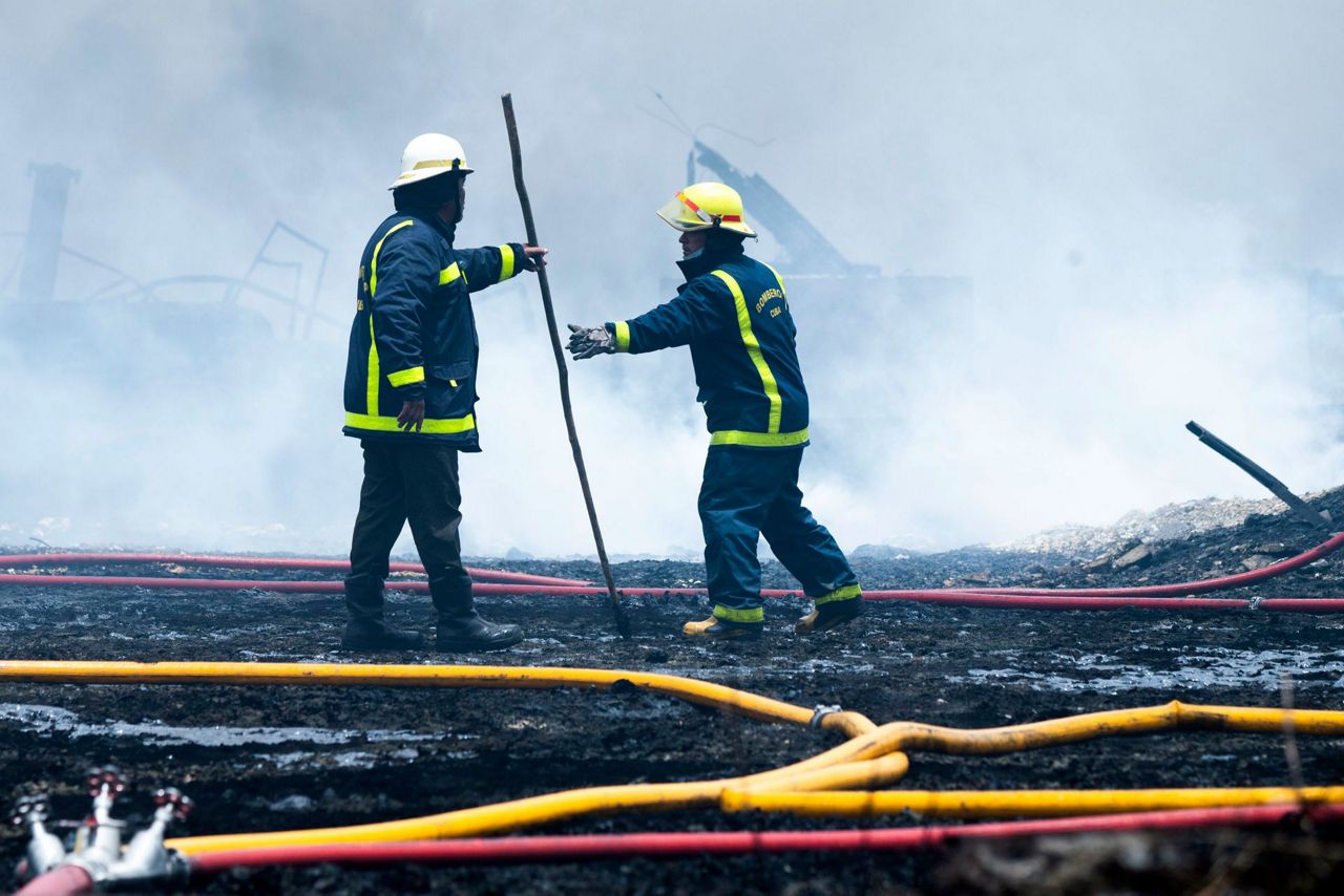 2nd firefighter dies as Cuba controls big oil facility fire