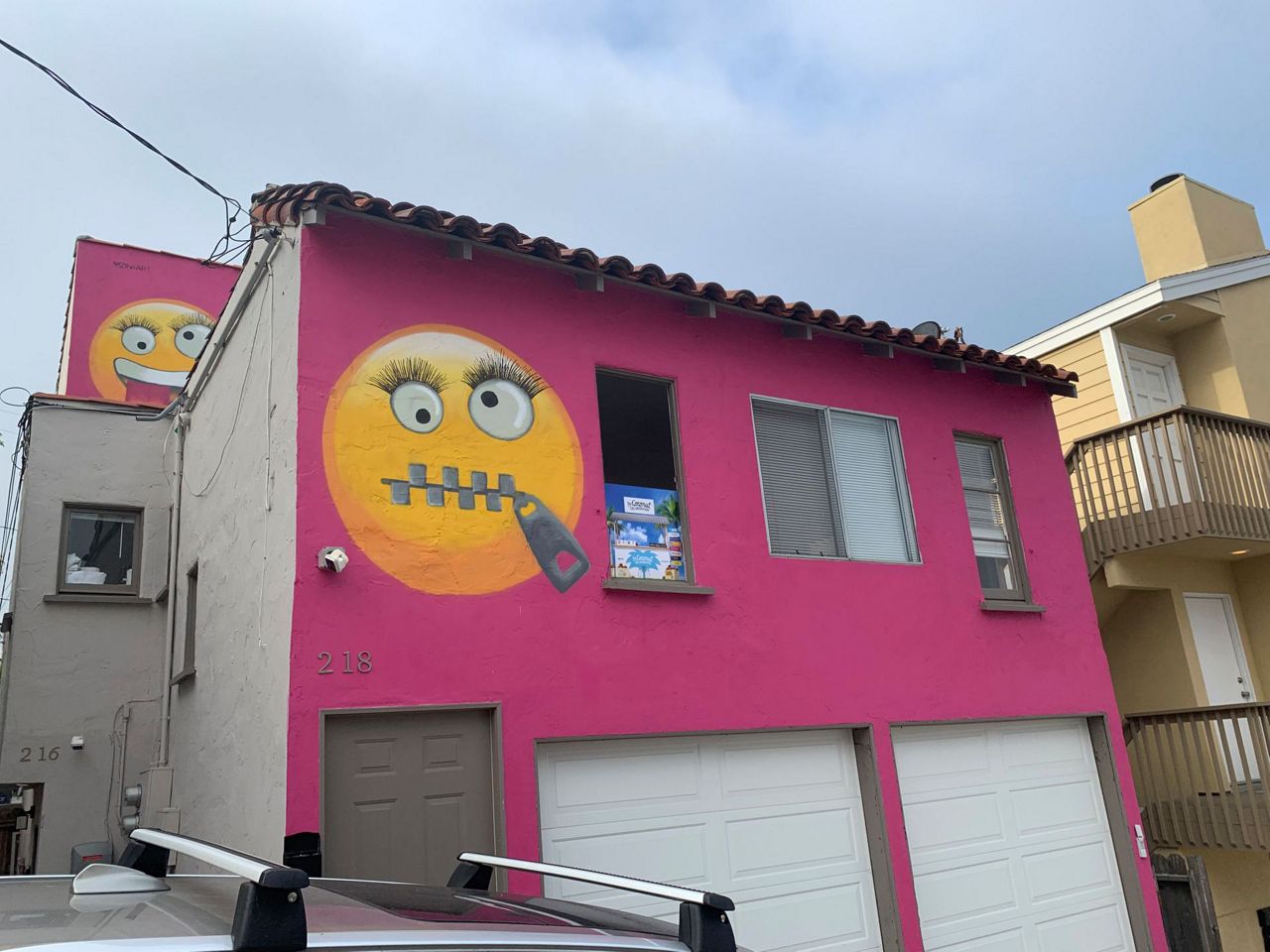 Giant emojis painted on house roil California community