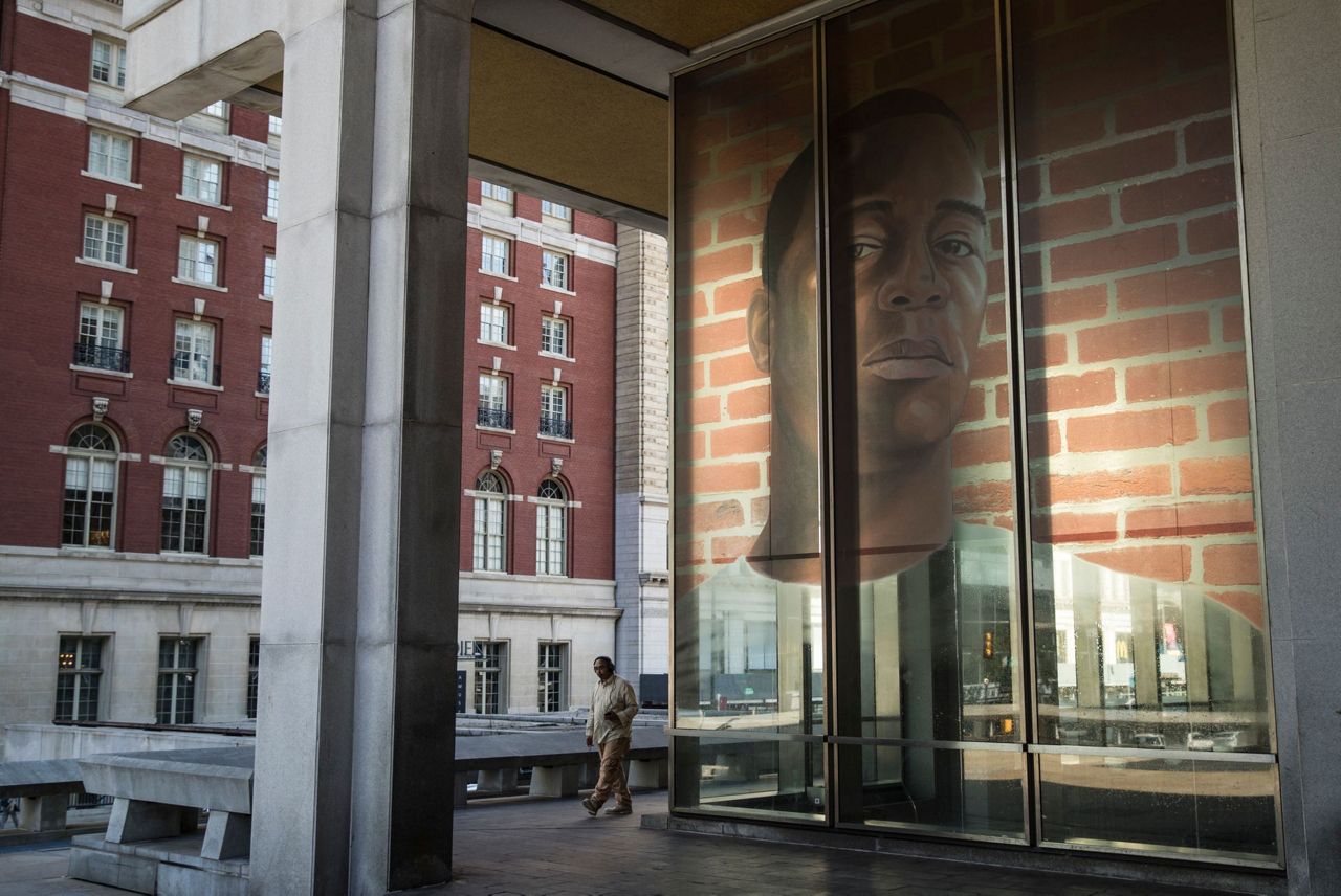 Mural of exinmates seeks public input on mass incarceration