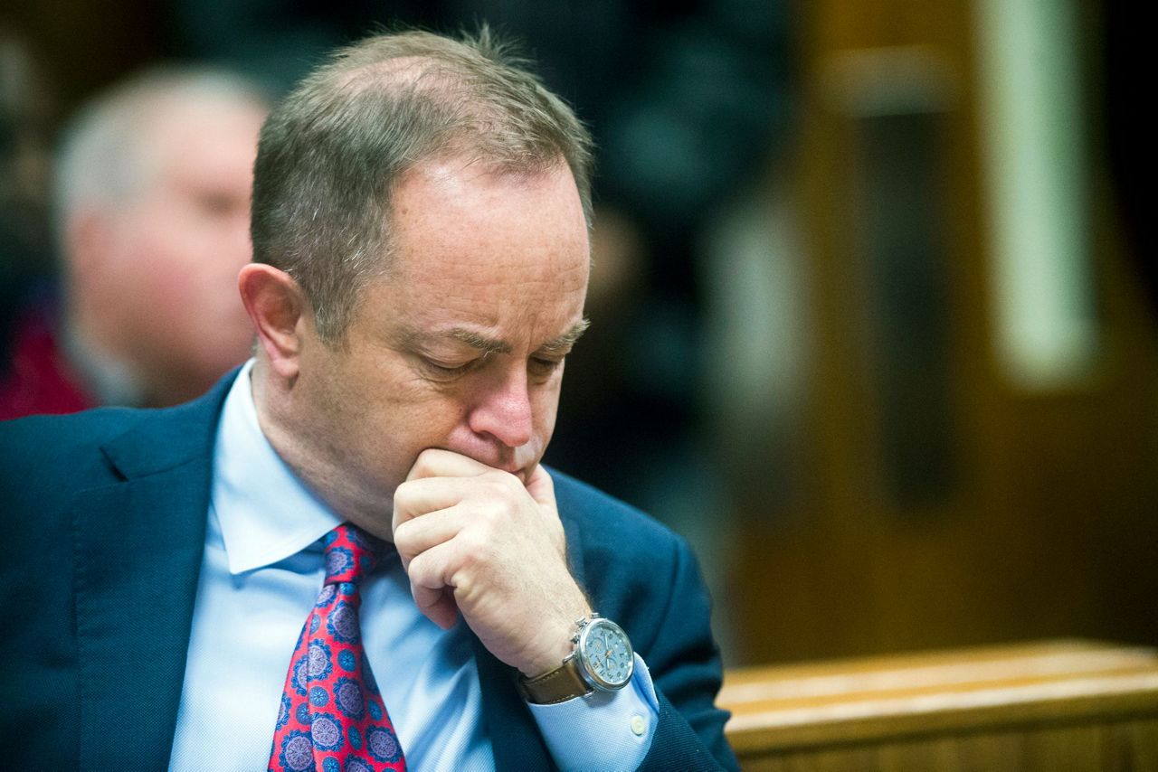 Michigan's medical chief to stand trial on Flint charges