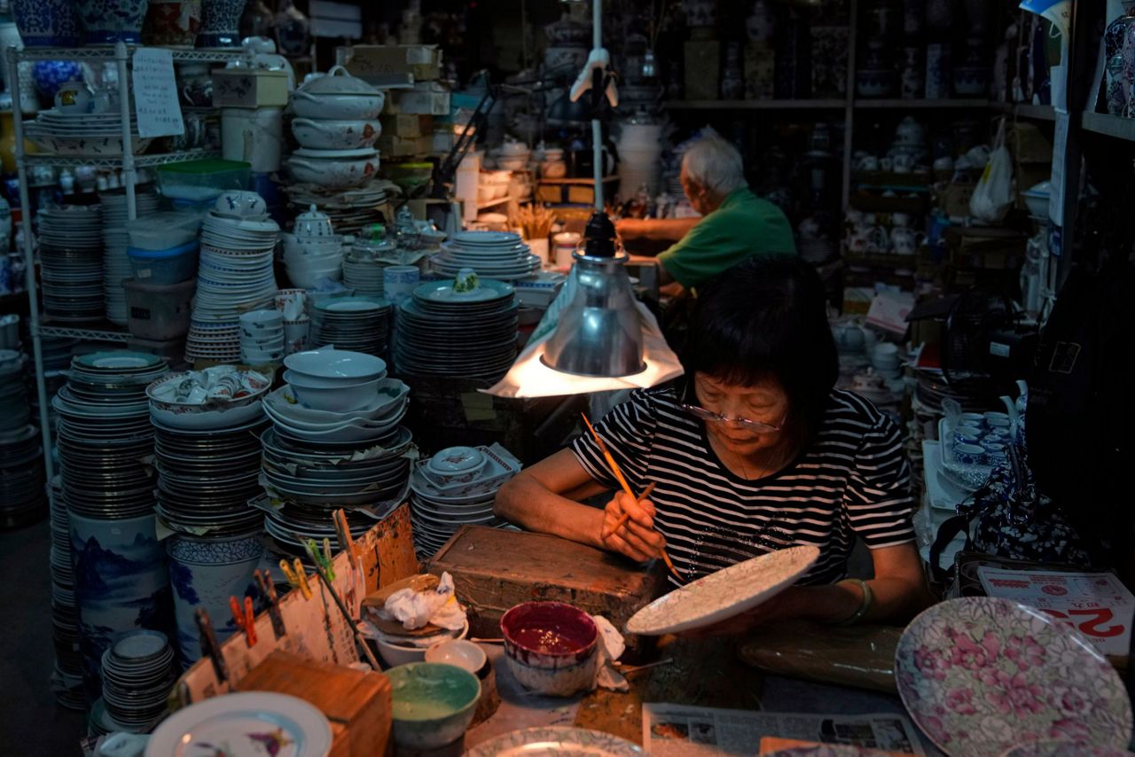 AP PHOTOS Hong Kong's last handpainted porcelain factory