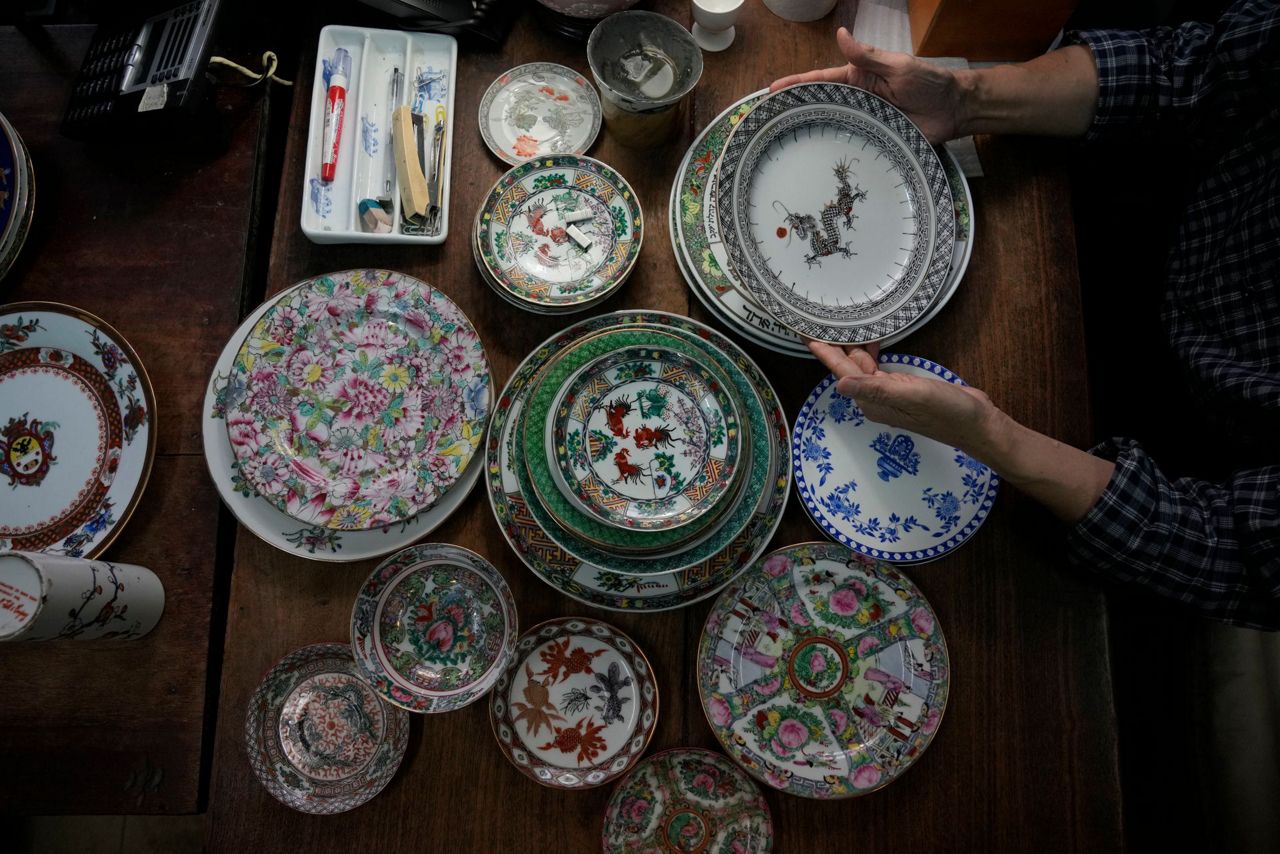AP PHOTOS Hong Kong's last handpainted porcelain factory