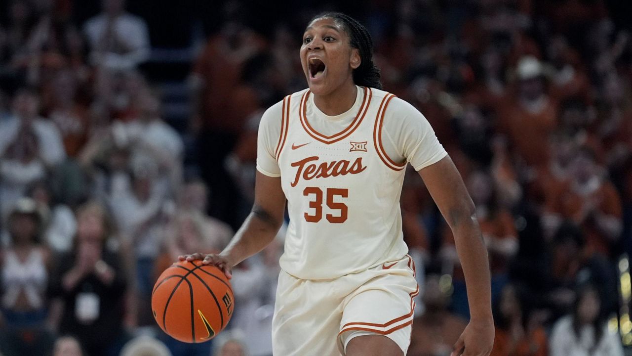 Texas freshman Booker shares Big 12 women's player of year