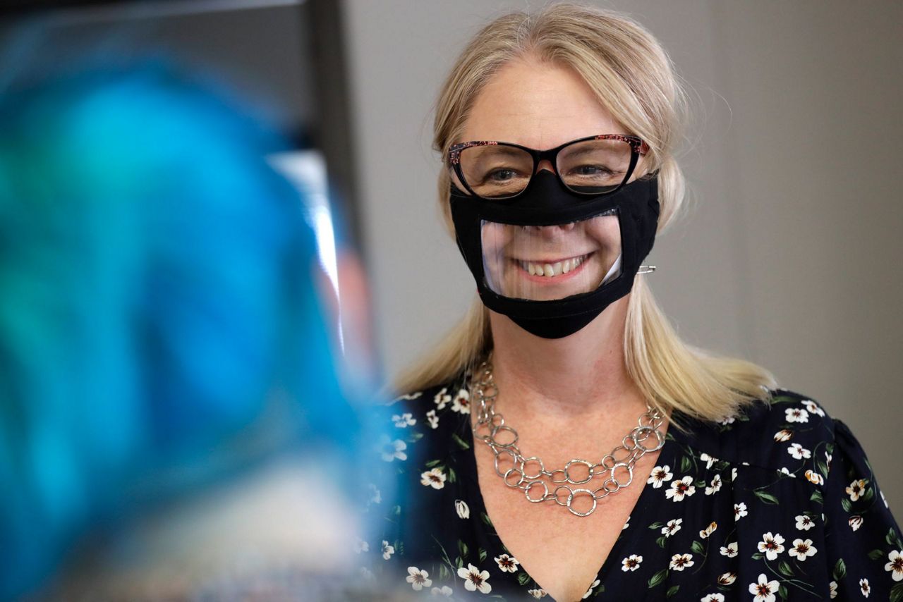 Face masks with windows mean more than smiles to deaf people