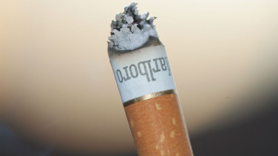 International maker of Marlboro kicks habit, stops selling cigarettes