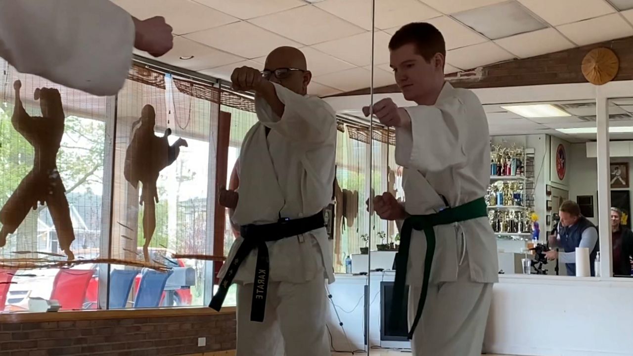 Karate student with special needs perseveres