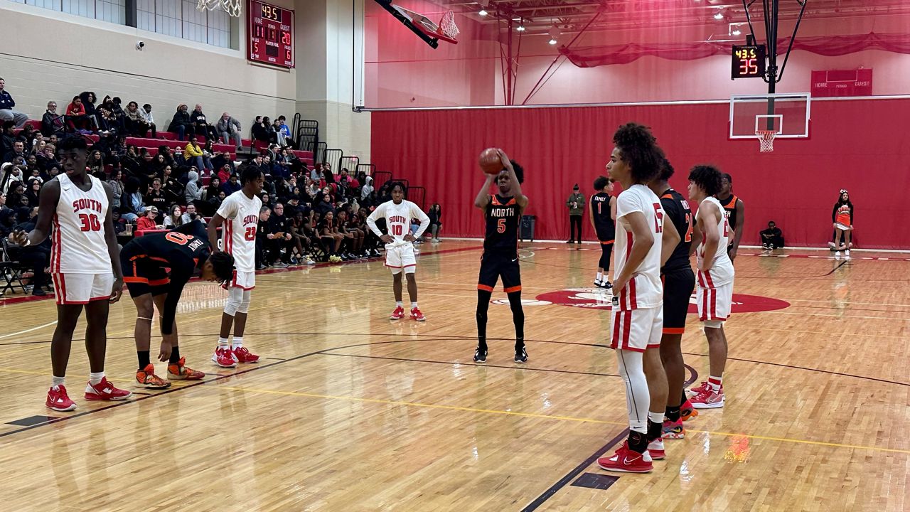 North boys basketball triumphs over South