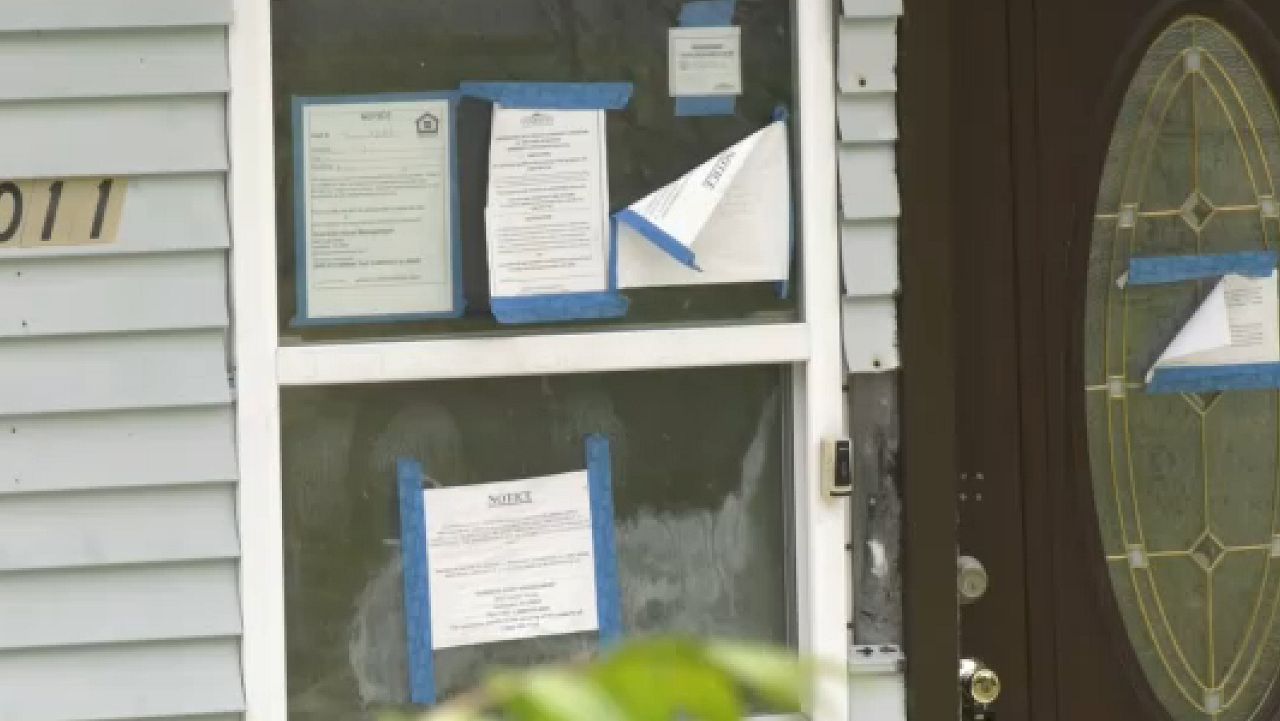 Mayors announce settlement in zombie property suits