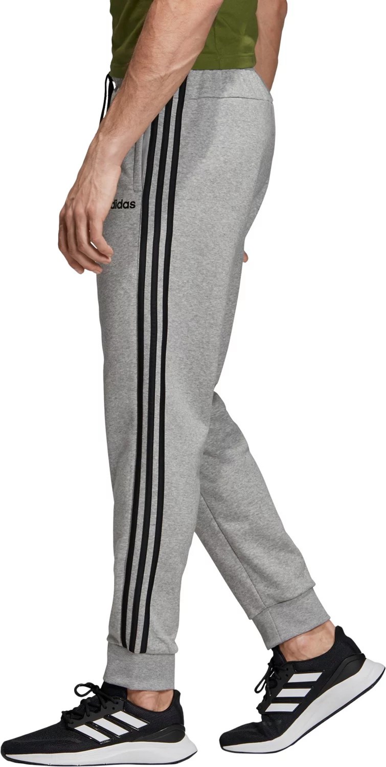 adidas Men's Essential 3Stripes Fleece Tapered Pants Academy