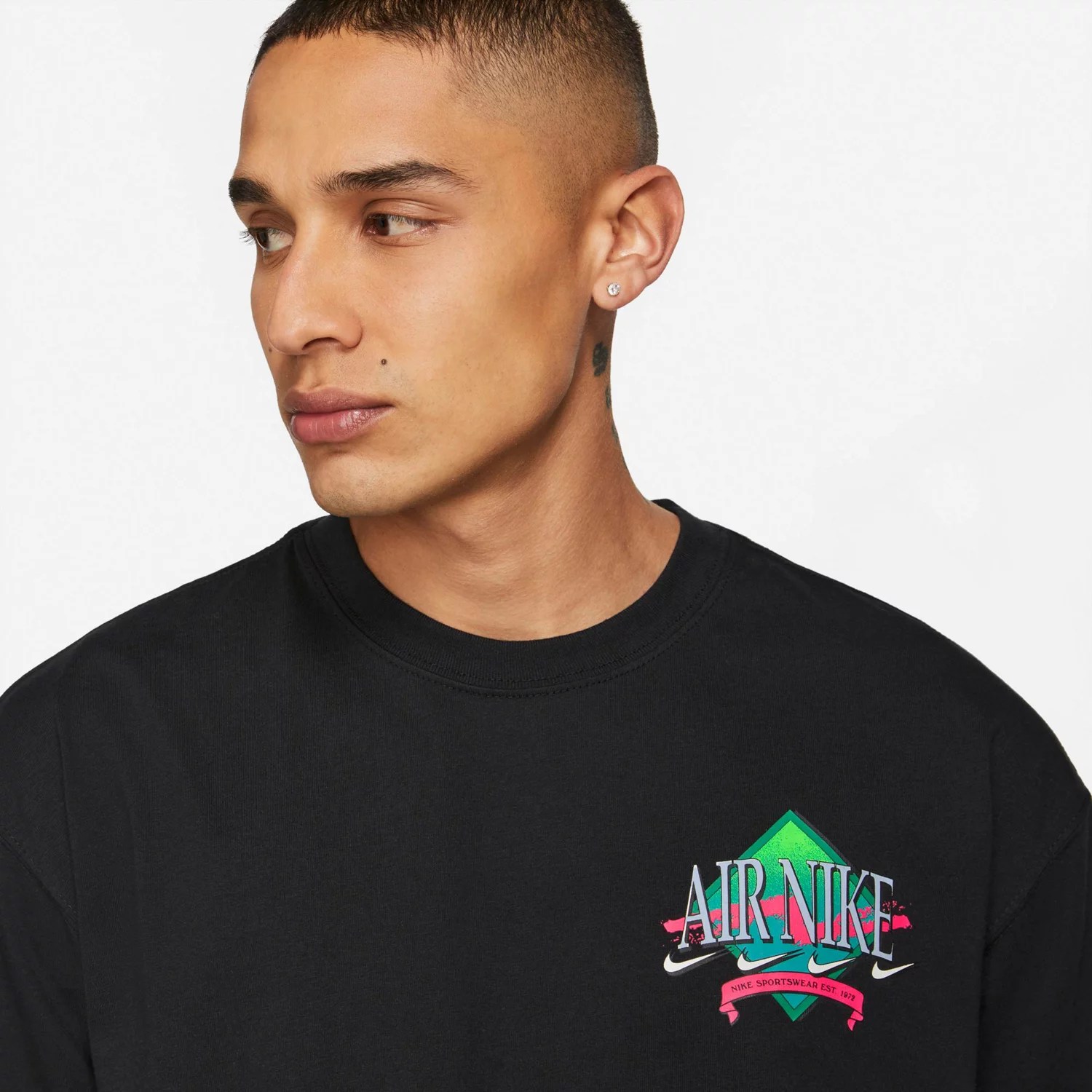 Nike Men's Sportswear DNA Air Loose Fit Short Sleeve Tshirt Academy