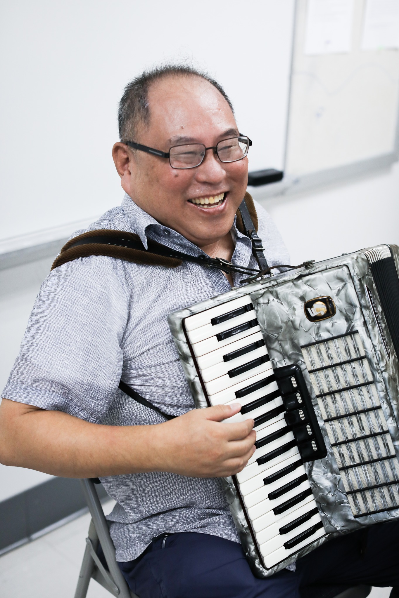 Seniors learn accordion in Flushing Salvation Army Connects