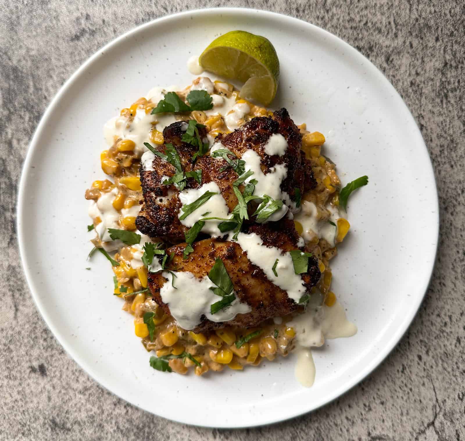 Chicken Thighs with Jalapeño Popper Creamed Corn Sammy Montgoms