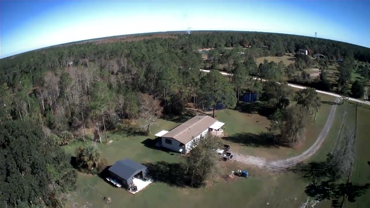 Manufactured home on 5 acres with pond and detached garage in New