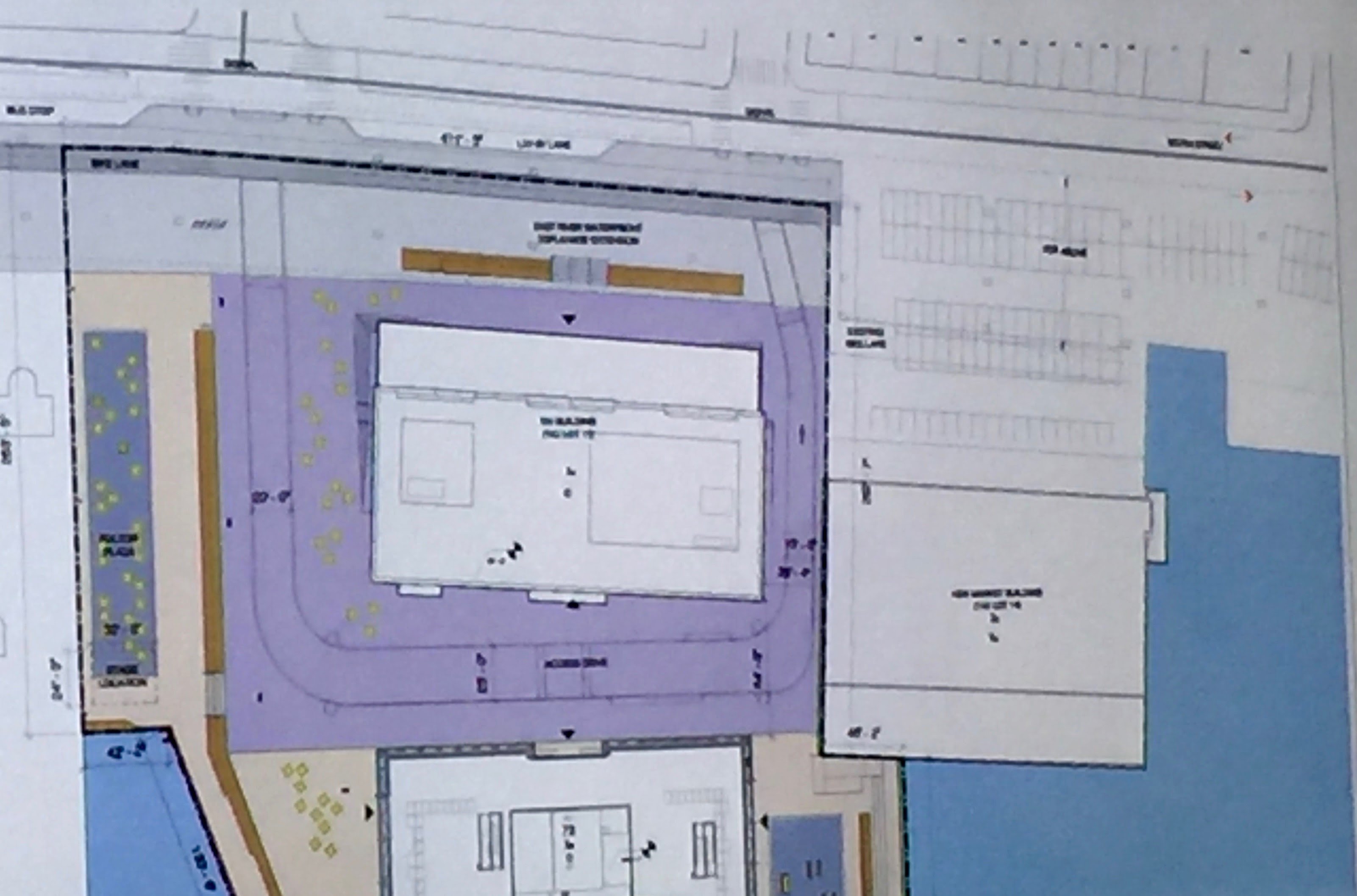 Howard Hughes Shrinks Tin Building, Clogs Beekman Street with Trucks