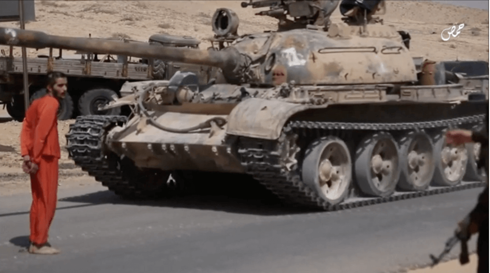 ISIS tank execution video 19 year old Syrian army prisoner crushed to