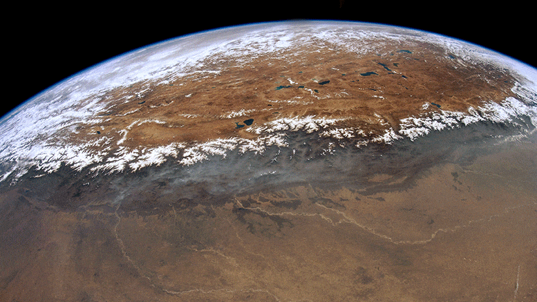 Himalayas, Near and Far Two Astronauts. Two Clear Days. Two