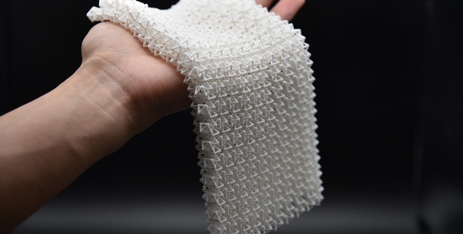 Innovative New Material Inspired by Chain Mail Transforms from Flexible