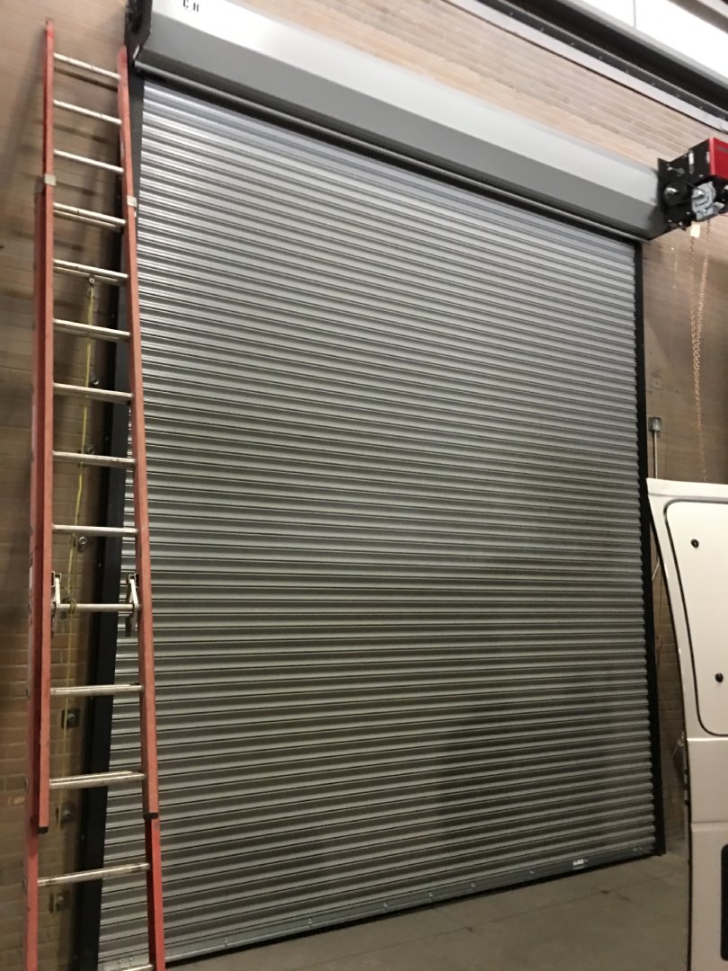 Installing Door Equipment in Chicago Scott Overhead Door Service, Inc