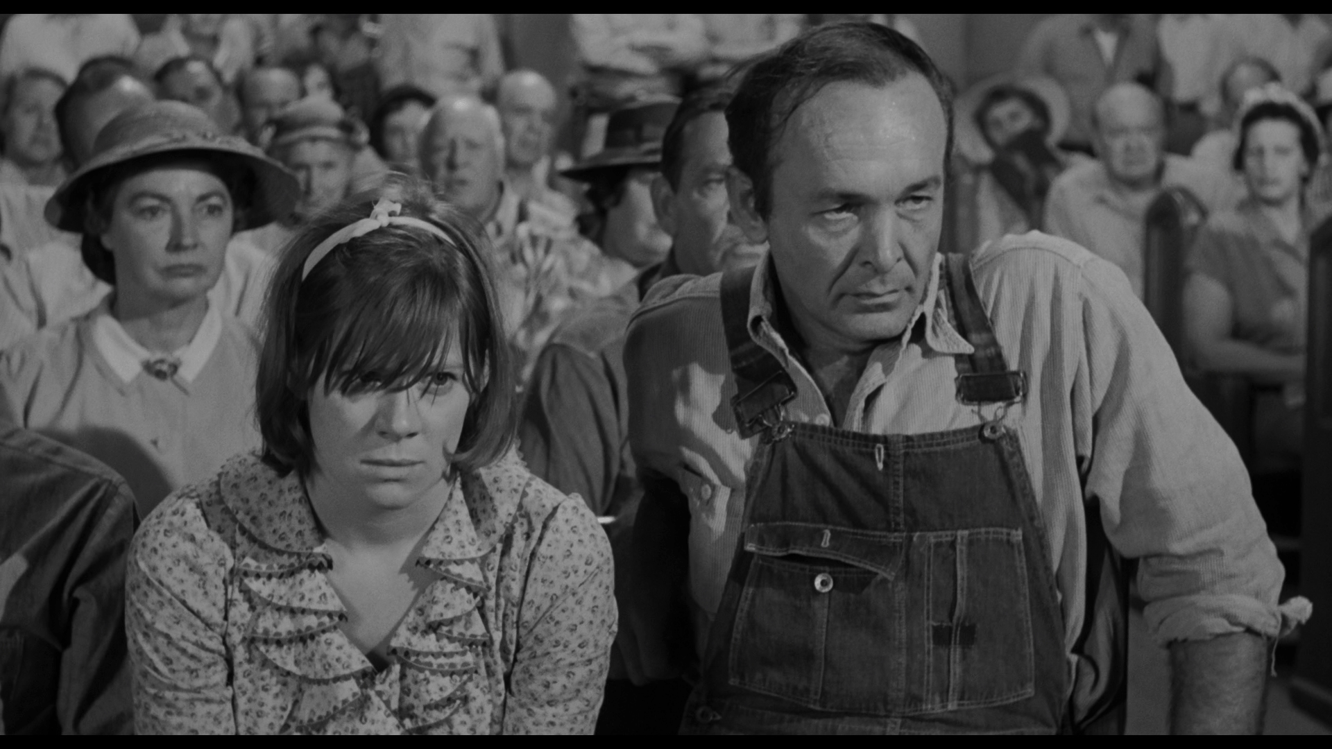 How does "To Kill a Mockingbird" interpret the coexistence of good and