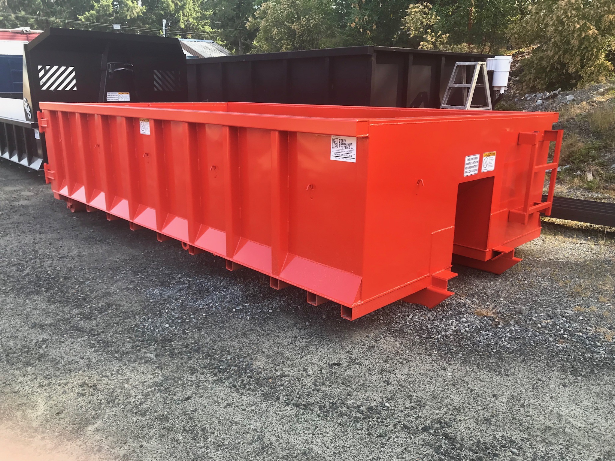 Rock Box Roll Off Container Orange SCS Manufacturing Inc.
