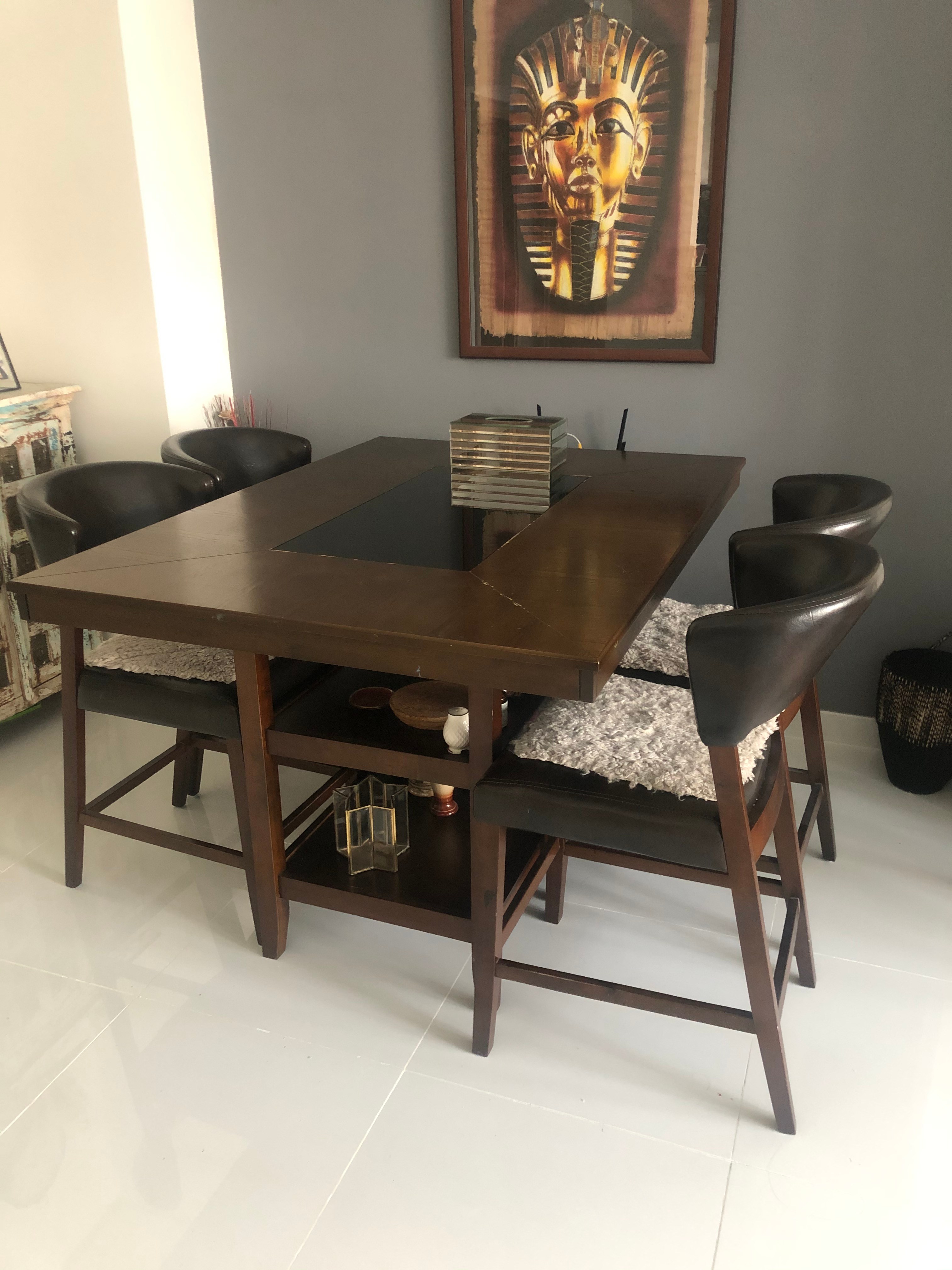 High Chair Dining Table with Storage Shelves. The table needs to be