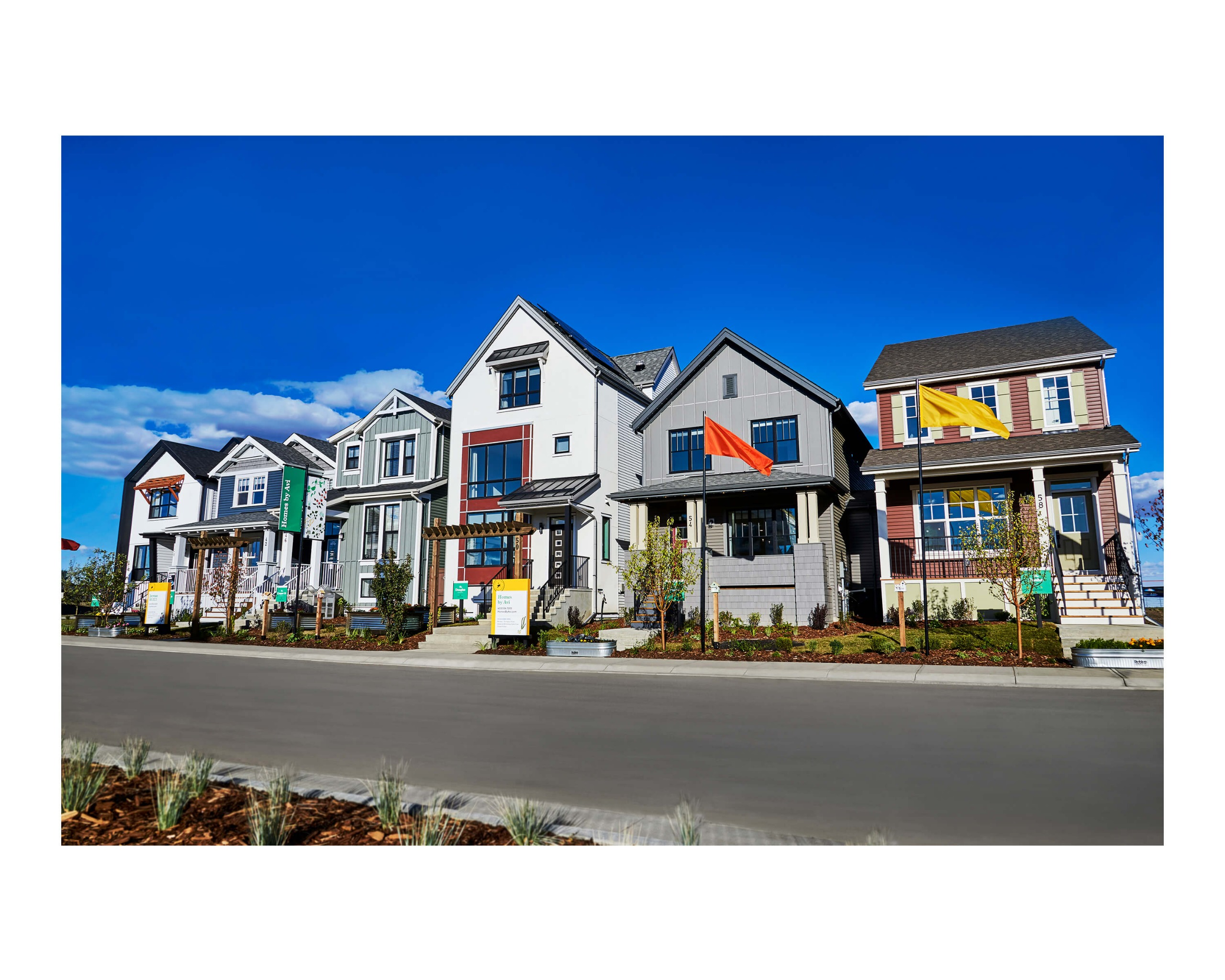 Homes sprouting up in awardwinning, gardengrowing Rangeview Section 23