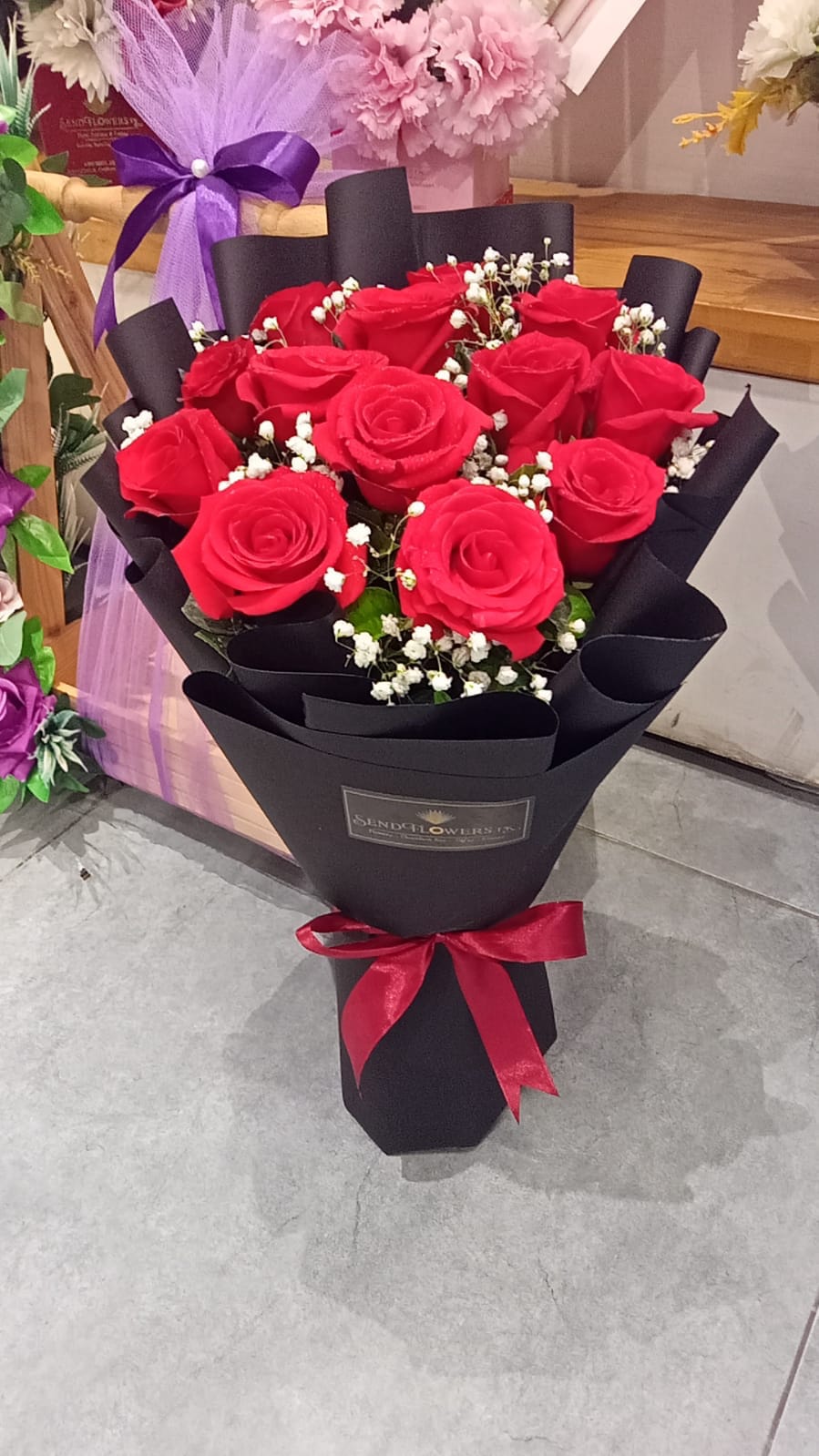 One Dozen of Red Roses Best. Online Flowers .SendFlowers.pk