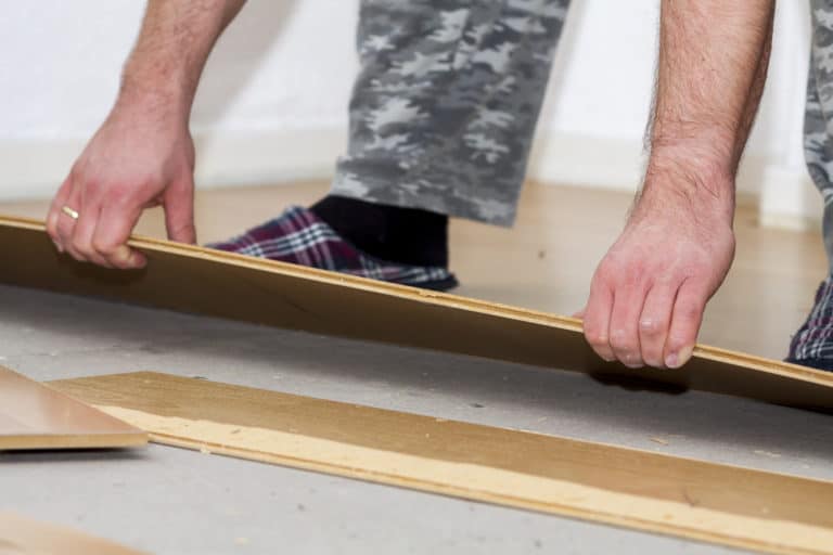 How to Remove Laminate Flooring (SnapOn and Glued) Sensible Digs