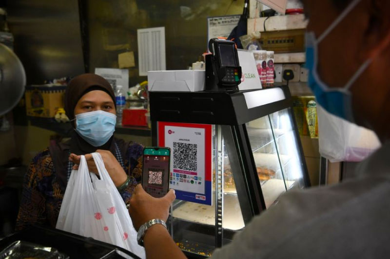 S'pore government outlines way to get hawkers on delivery platforms