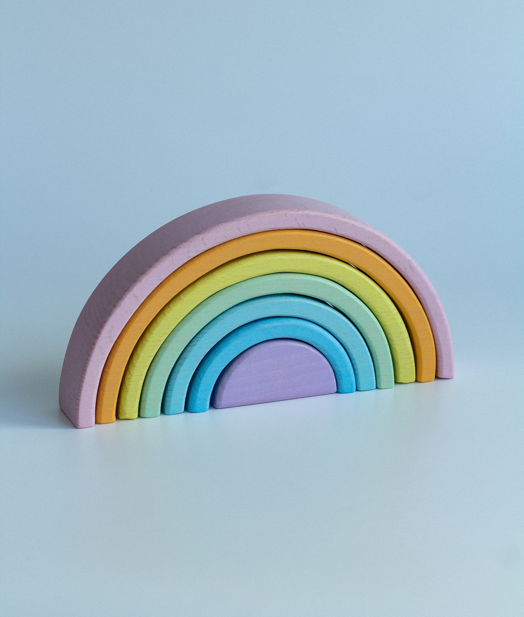 Children's wooden toy rainbow 26051 from WoollyFox with donate to u24
