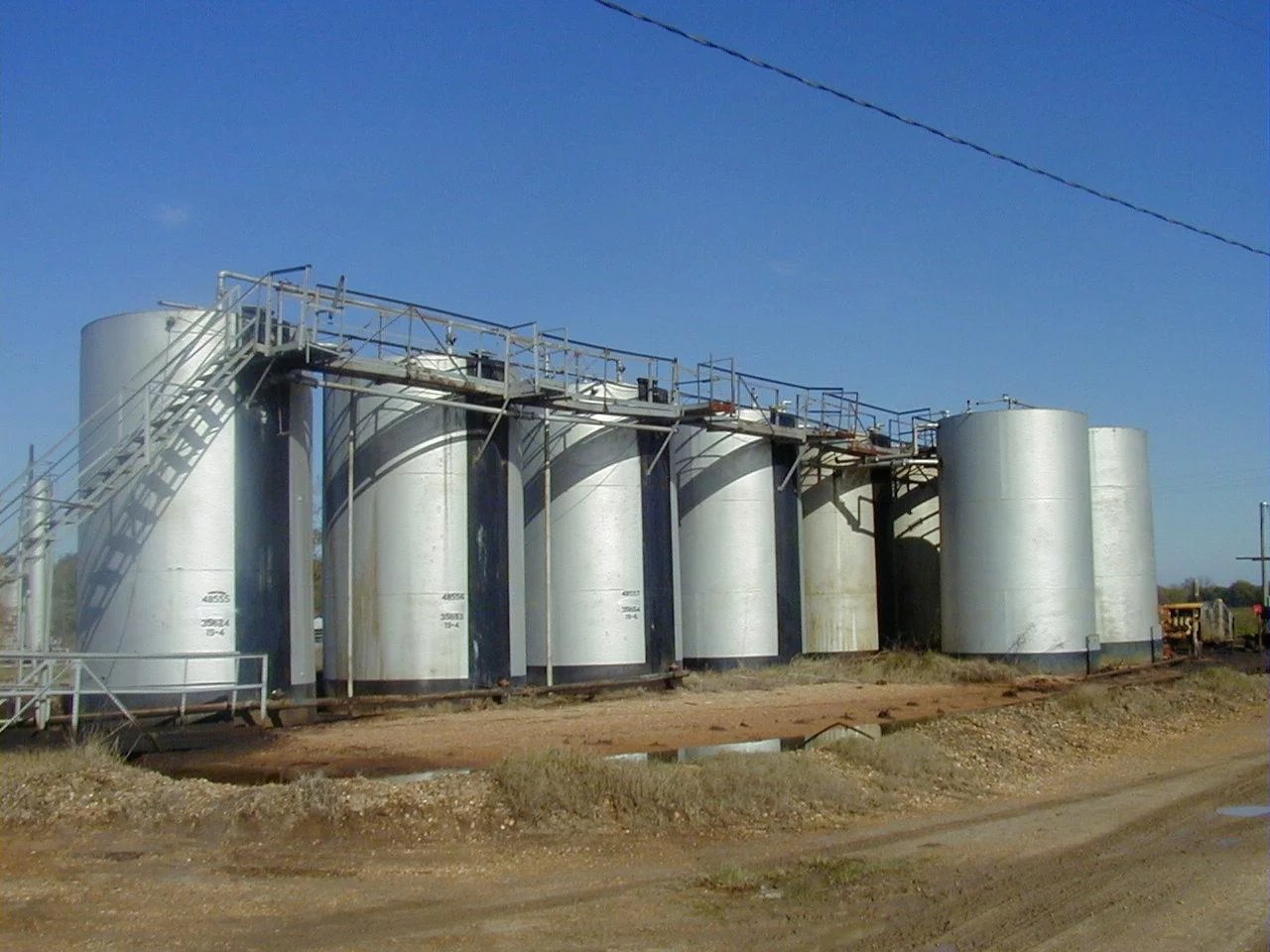 Lake St. John Field Tank Battery Oil and Gas Investment Shale