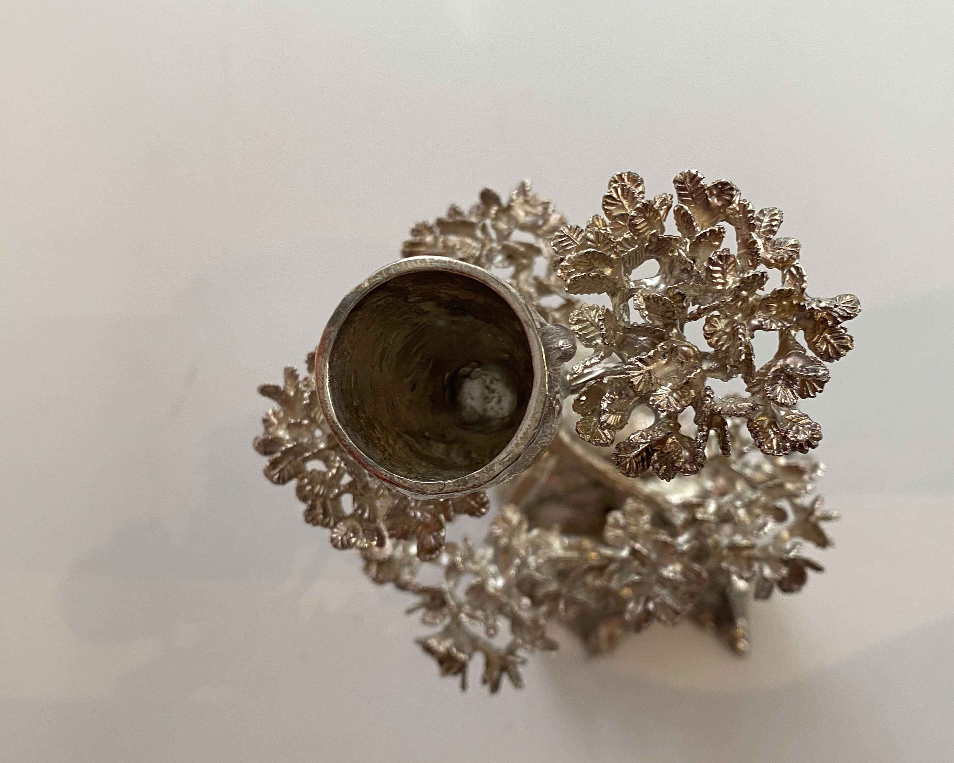 A silver cast 'Root Tree & Elephant' candle holder, Patrick Mavros