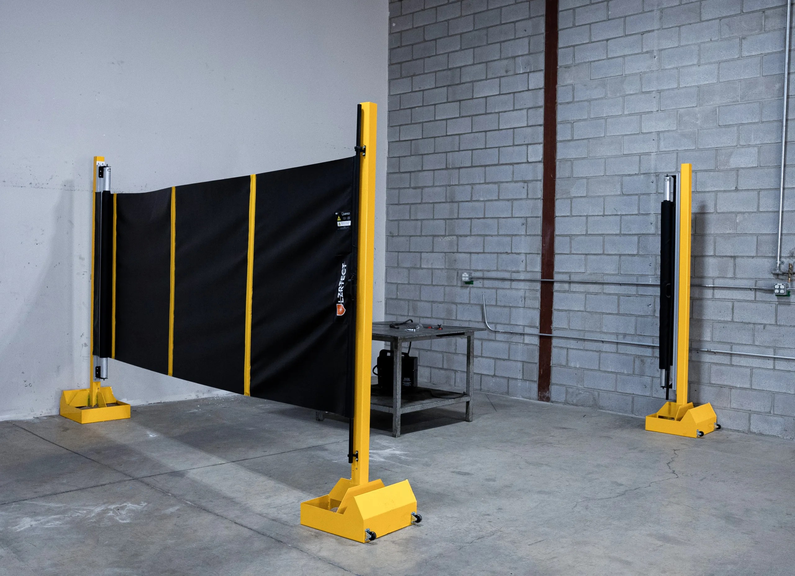 LZRTect Retractable Laser Weld Screens Shaver Industries